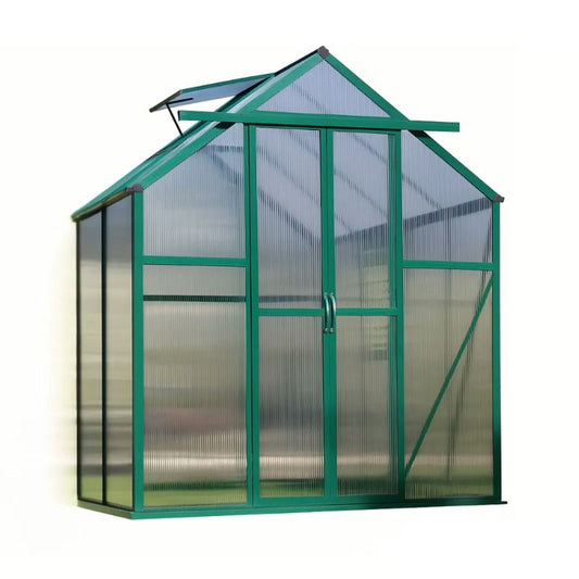 Green greenhouse with transparent panels on a white background
